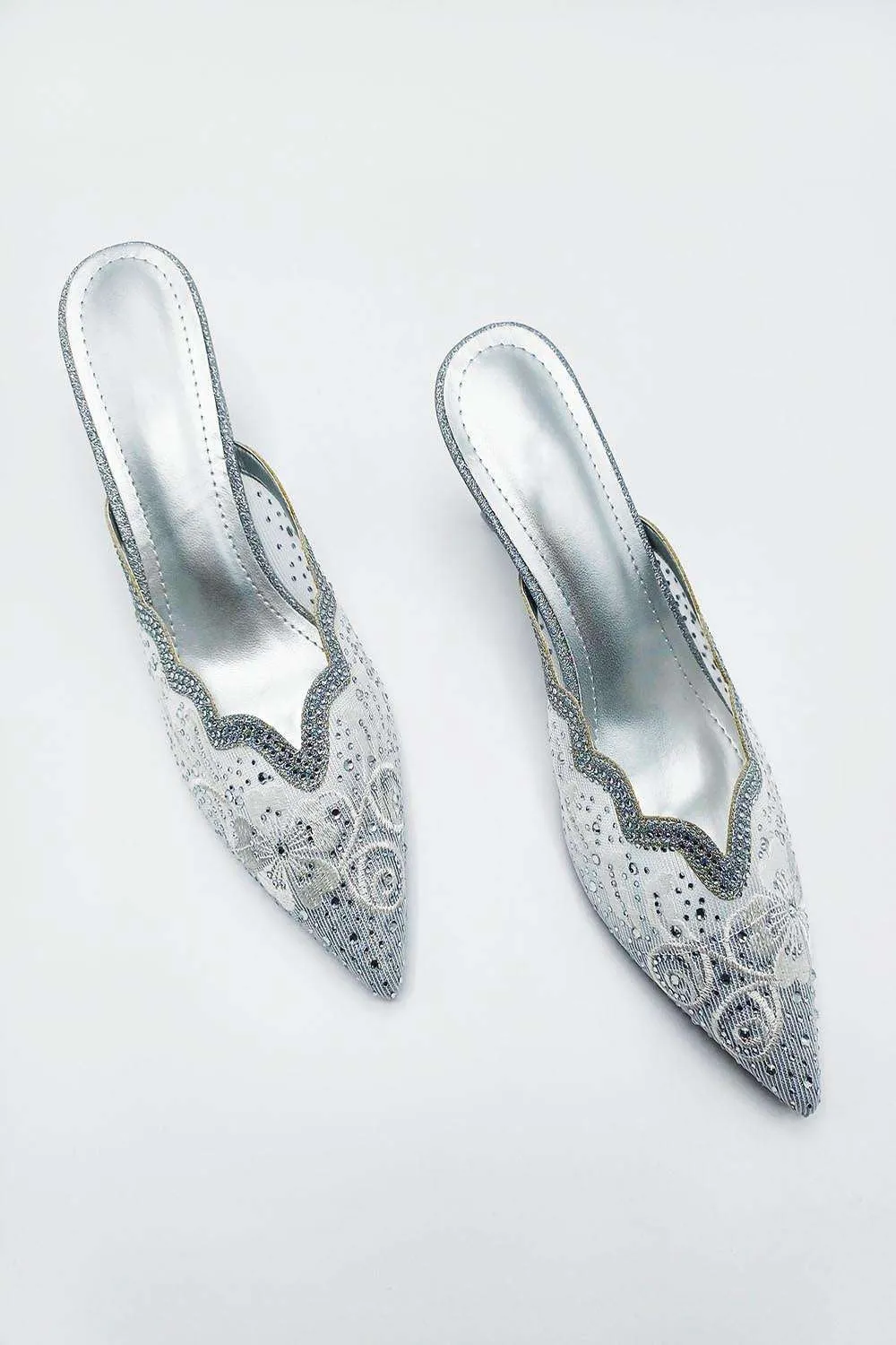 Elia Flower & Diamante Pointed Slip On Mules in Silver